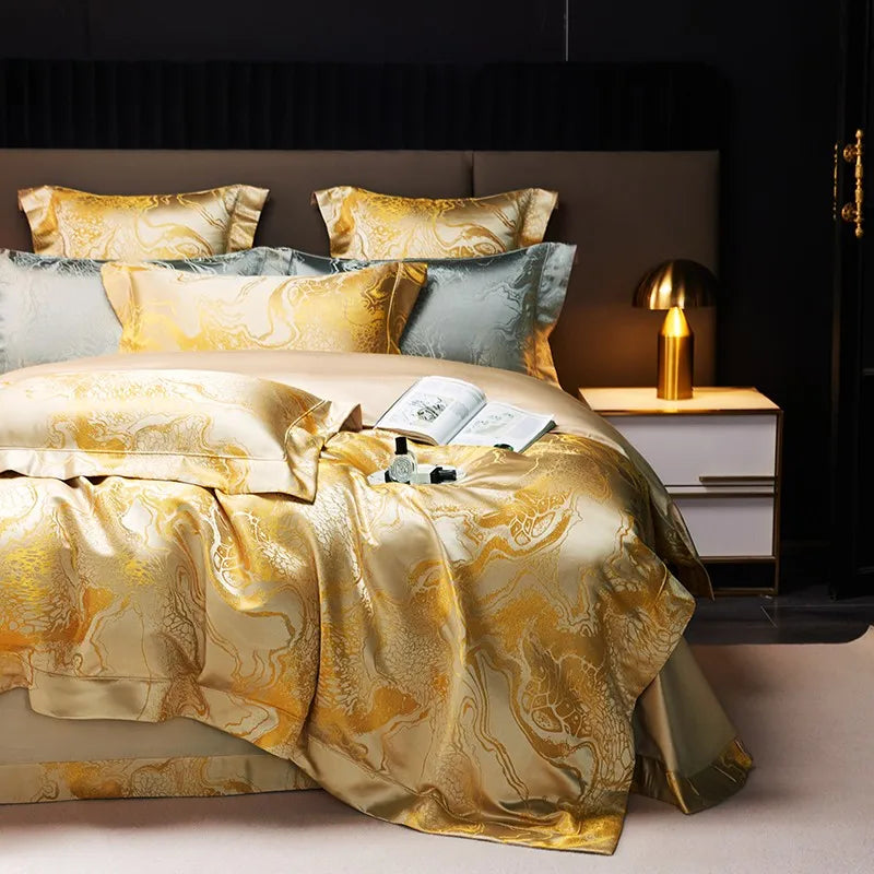 White and gold jacquard bedding set with layered pillows and a flowing marble design in a dark modern bedroom – L&B