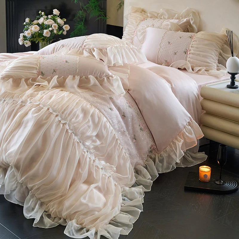 Blush pink princess bedding layered with ivory lace ruffles and matching pillow shams, RUBYLACE BLUSH – L&B