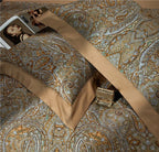 Gold and pale blue baroque pillow shams layered with 1000TC Egyptian cotton bedding, ZLIKAN – L&B