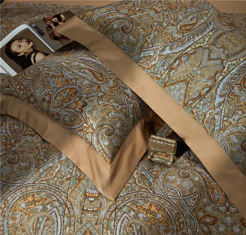 Gold and pale blue baroque pillow shams layered with 1000TC Egyptian cotton bedding, ZLIKAN – L&B