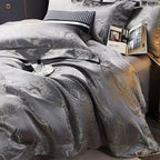 Luxury charcoal gray bedding set with coordinated jacquard shams and a richly draped duvet cover – L&B