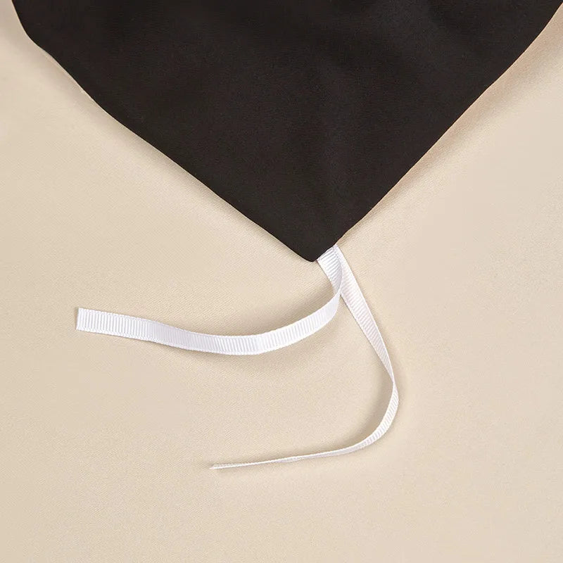 Interior corner tie on the black and ivory duvet cover designed to help secure the duvet insert in place – L&B