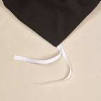 Interior corner tie on the black and ivory duvet cover designed to help secure the duvet insert in place – L&B