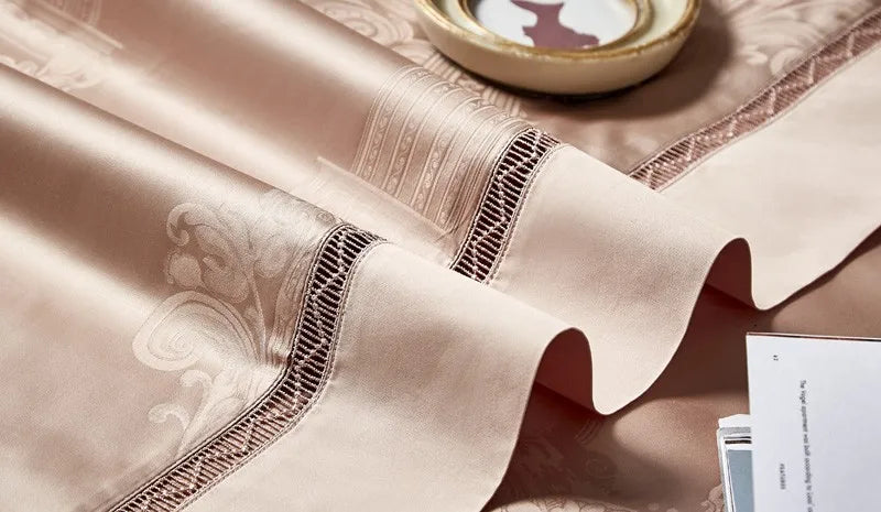 Close-up of tonal braided trim and piping on the champagne beige Egyptian cotton satin bedding - L&B