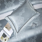 Sky blue damask decorative pillow with an architectural jacquard pattern and elegant tailored border – L&B