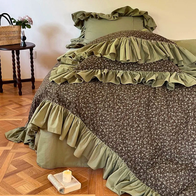 Olive green floral ruffle bedding set styled in a warm vintage cottage bedroom, MOSSBELLE – L&B