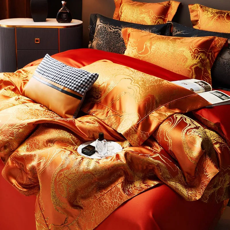 Burnt orange duvet cover set in relaxed layered styling with rich jacquard texture and coordinating decorative pillows – L&B
