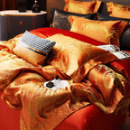 Burnt orange duvet cover set in relaxed layered styling with rich jacquard texture and coordinating decorative pillows – L&B