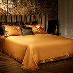 Solid burnt orange flat sheet with a smooth satin finish and coordinating decorative pillows – ROYAL H. ORANGE – L&B