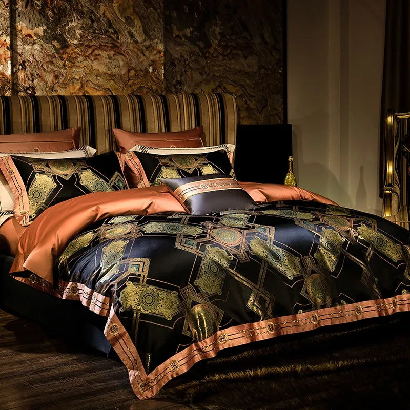 Black and gold bedding set styled with copper-toned borders and coordinating decorative pillow shams – ROYAL H. BLACK – L&B