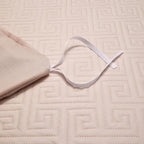 Blush pink quilted bedspread with geometric stitching and refined edge detail, LUSTRA BLUSH – L&B