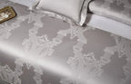 Silver gray Egyptian cotton satin bedding with an ornate damask pattern and same-tone braided trim – L&B