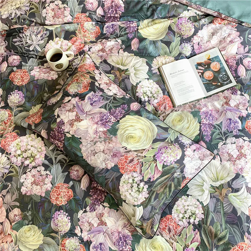 Close-up of black floral bedding with pink roses, peonies and hydrangea-style blooms, FLOWER GARDEN – L&B