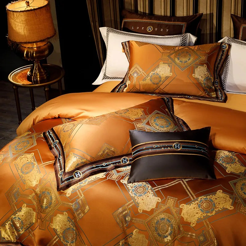 Burnt orange duvet cover with gold baroque medallions and layered decorative pillows – ROYAL H. ORANGE – L&B
