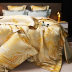 Luxury gold bedding set styled with a marbled jacquard duvet cover and coordinating decorative pillow shams – L&B