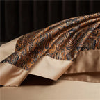 Brown paisley duvet cover with a contrasting beige reverse and fluid drape, ZUVRIC – L&B