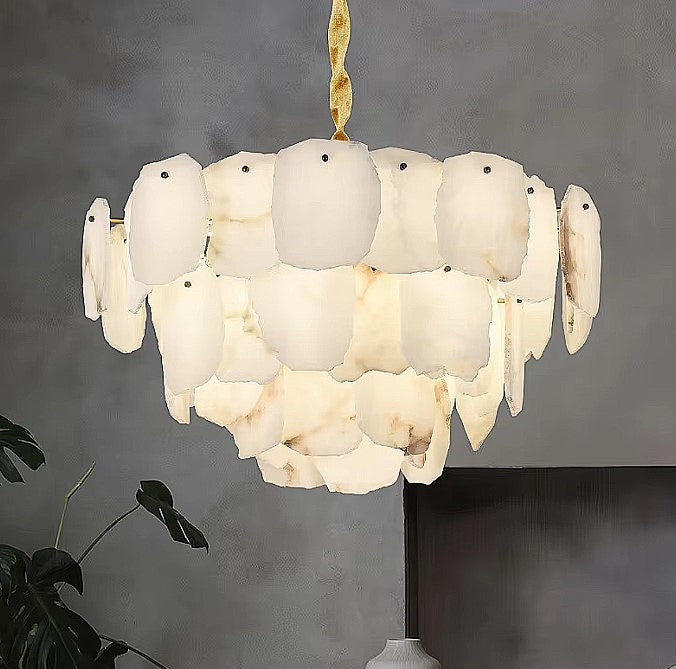 Close-up of a glowing natural alabaster petal chandelier with irregular raw edges - L&B