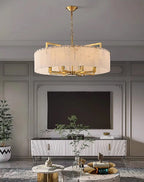 Modern alabaster living room chandelier with a gold frame and warm ambient glow -L&B