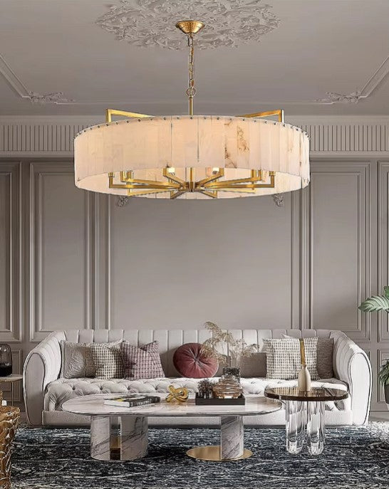 Statement alabaster chandelier in a modern luxury living room with neutral decor- L&B
