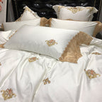Ivory duvet cover with scattered gold floral embroidery and a lace border, STONGE ROYAL – L&B