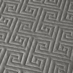 Close-up of pewter gray labyrinth-pattern quilted bedspread texture, LUSTRA PEWTER – L&B
