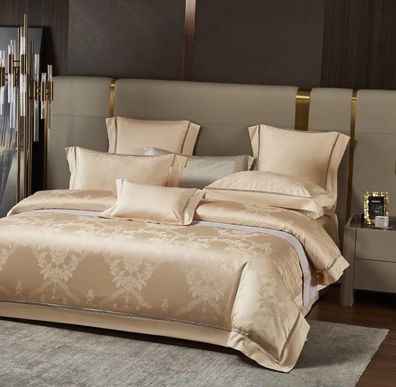 Luxury gold bedding set styled with a damask jacquard duvet cover and coordinating champagne gold pillows - L&B