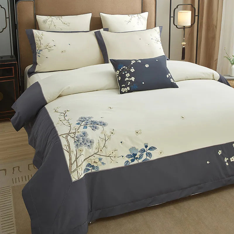 Ivory and gray embroidered duvet cover set with a botanical corner motif and matching Egyptian cotton shams – L&B