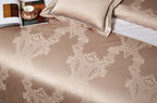 Champagne beige jacquard duvet cover with an ornate damask pattern and lustrous Egyptian cotton satin finish - L&B