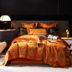 Burnt orange jacquard duvet cover set with coordinated shams and accent pillows in a dark modern bedroom – L&B