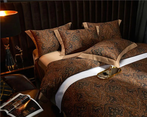 Luxury brown paisley Egyptian cotton bedding shown from an angled bedside view, ZUVRIC – L&B