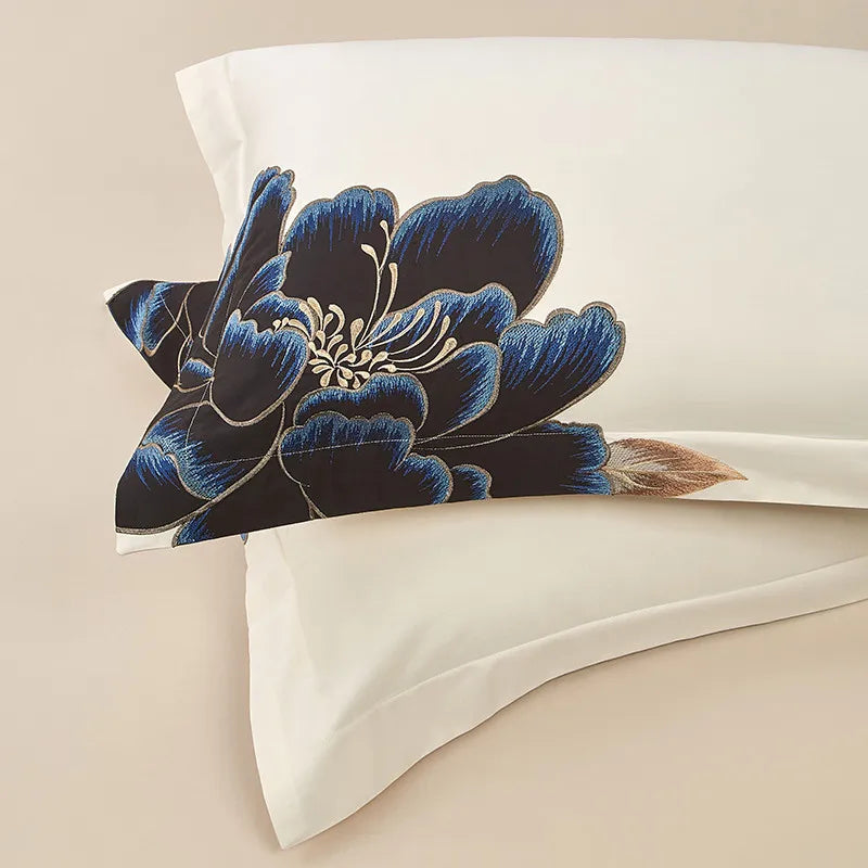 Blue peony embroidered pillow sham on ivory Egyptian cotton with gold leaf accents and botanical detailing – L&B