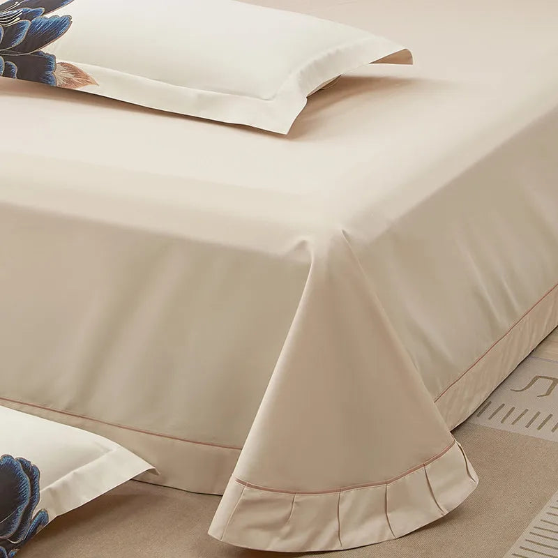 Ivory Egyptian cotton bed sheet with a smooth drape and refined tailored edge from the embroidered bedding set – L&B