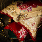 Ivory floral embroidered pillow shams with red scalloped borders and luminous gold jacquard detailing – L&B