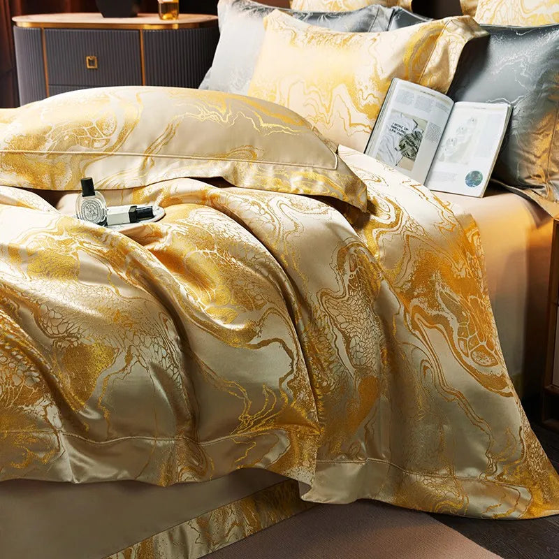 Gold Egyptian cotton bedding set arranged with matching jacquard shams and a flowing duvet cover on a modern bed – L&B