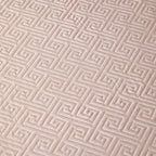 Close-up of blush pink geometric quilted bedspread texture from the LUSTRA BLUSH bedding set – L&B