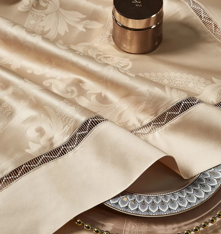 Close-up of tonal braided trim and piping on the gold Egyptian cotton satin duvet cover - L&B