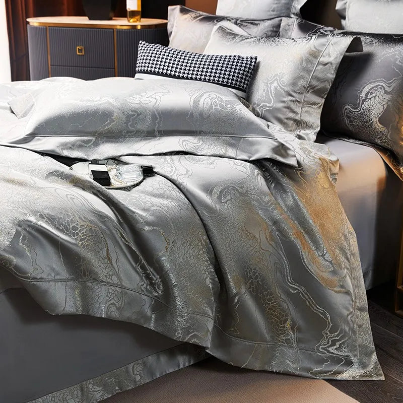 Silver gray luxury bedding set with matching jacquard shams and a luminous duvet cover in a modern bedroom – L&B