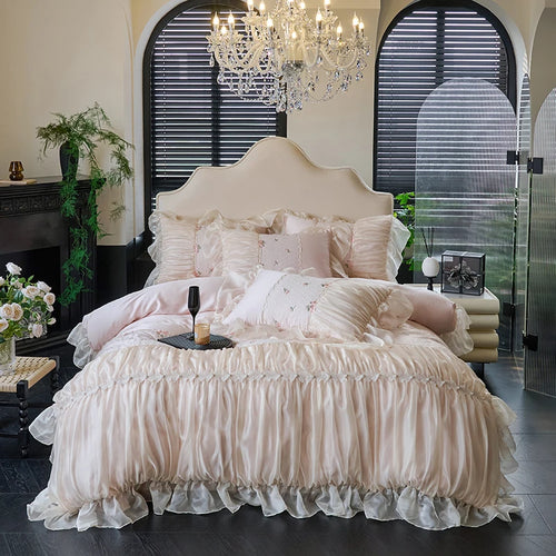 Blush pink princess ruffled lace duvet cover and bed skirt set, RUBYLACE BLUSH styled in an elegant bedroom – L&B