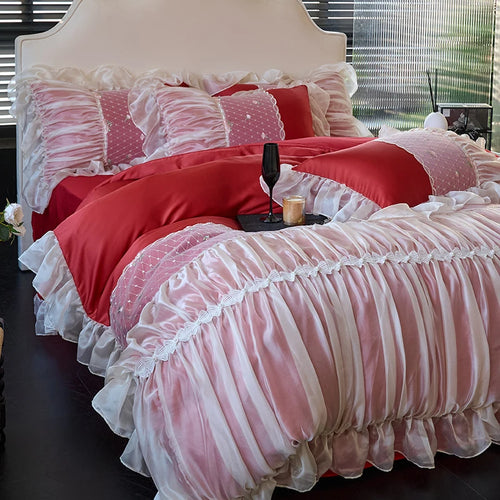 Red and white princess ruffled lace duvet cover and bed skirt set, RUBYLACE RED styled in a romantic bedroom – L&B