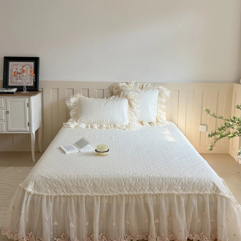 Ivory white cottagecore bedding displayed with a heart-quilted duvet cover and romantic ruffle bed skirt – L&B