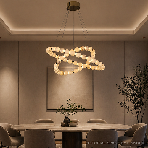Modern alabaster globe ring chandelier above a console table in a contemporary dining room - L&B