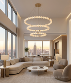 Modern multi-tier alabaster chandelier in an airy organic modern living room - L&B