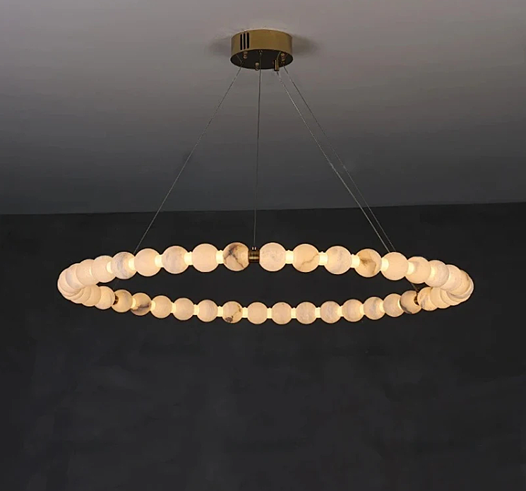 Large alabaster orb ring chandelier with cable suspension and a warm ambient glow for modern interior- L&B