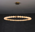Large alabaster orb ring chandelier with cable suspension and a warm ambient glow for modern interior- L&B