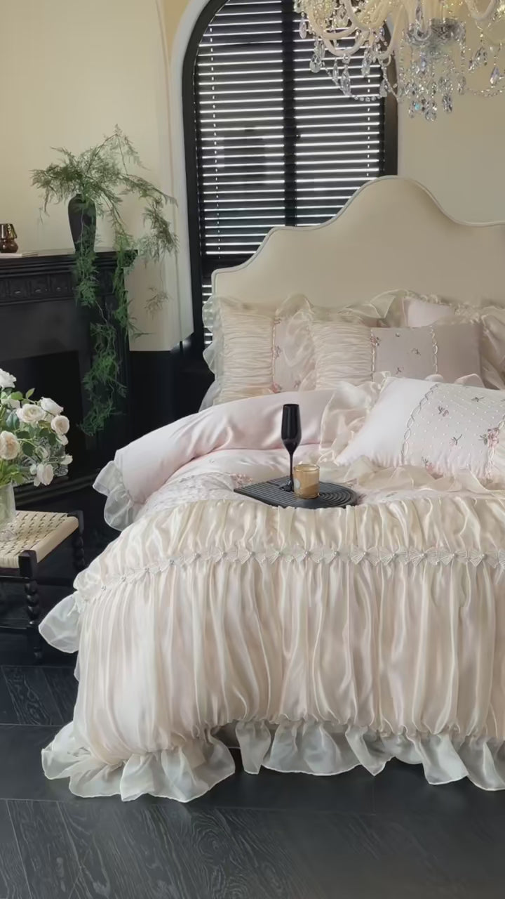Real video of an ivory princess ruffled lace duvet cover and bed skirt set, highlighting floral embroidery and layered ruffles – L&B RUBYLACE IVORY