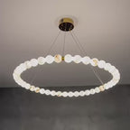 AURELIA natural Spanish alabaster globe ring chandelier showing 360° halo illumination and adjustable lighting - L&B