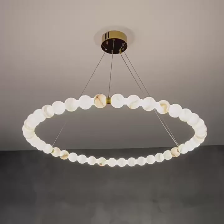 AURELIA natural Spanish alabaster globe ring chandelier showing 360° halo illumination and adjustable lighting - L&B